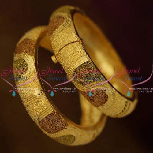 B10212 Broad Screw Open Forming Gold Plated Bangles Latest Rich Look Jewellery Online