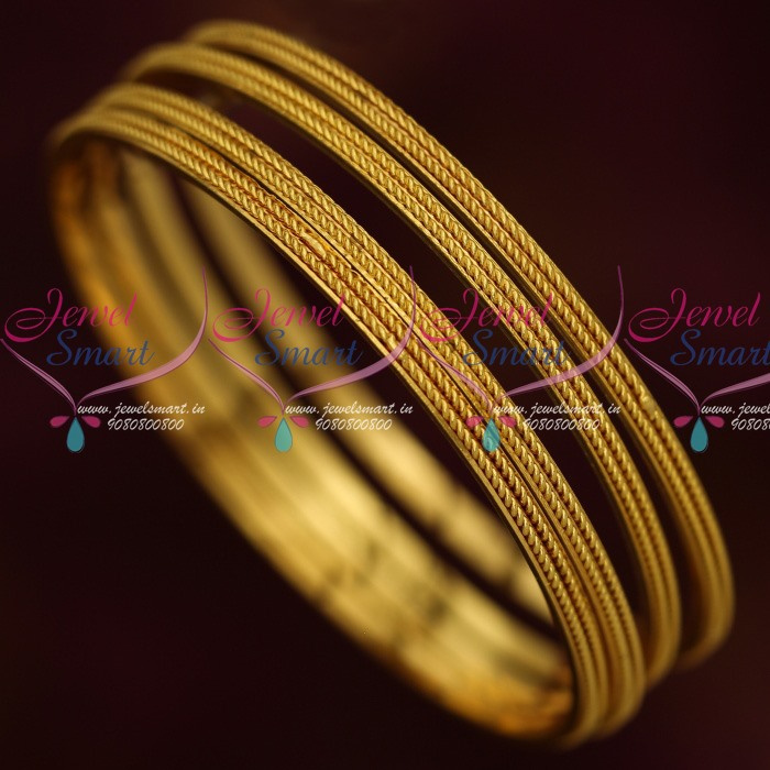 Gold bangle with circle discount and line through it